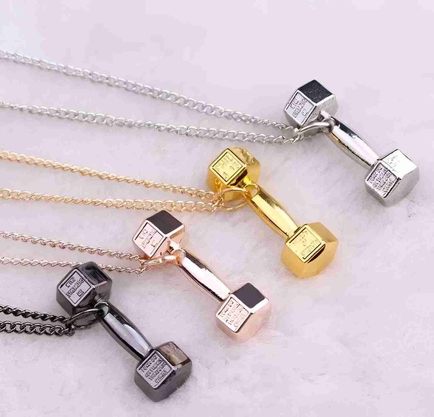 Titanium Barbell Necklace – Trendy Dumbbell Pendant for Fitness Enthusiasts.