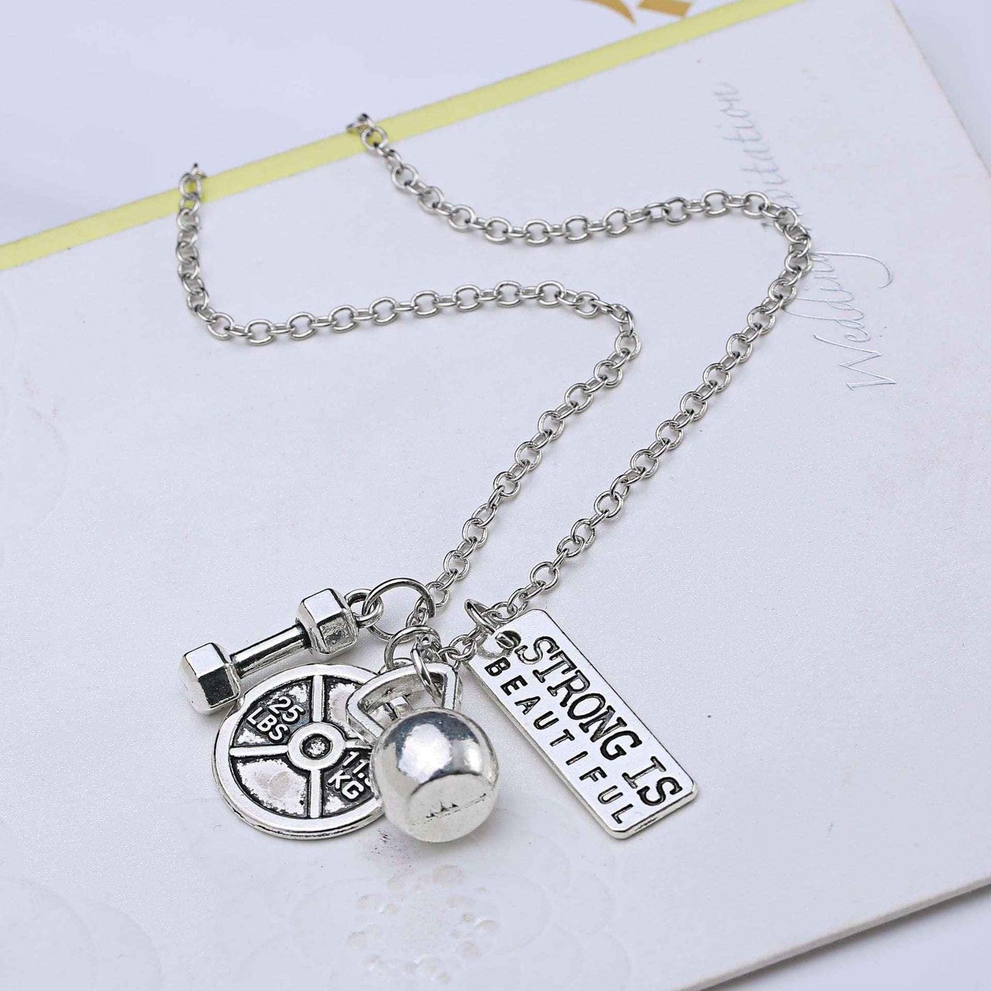 Titanium Steel Dumbbell & Barbell Pendant Necklace – Stylish Gym Jewelry for Fitness Lovers.